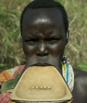 The Ethiopian Suri Tribe defines beauty based upon the size of a womans lip plate. www.blacklikemoi.com